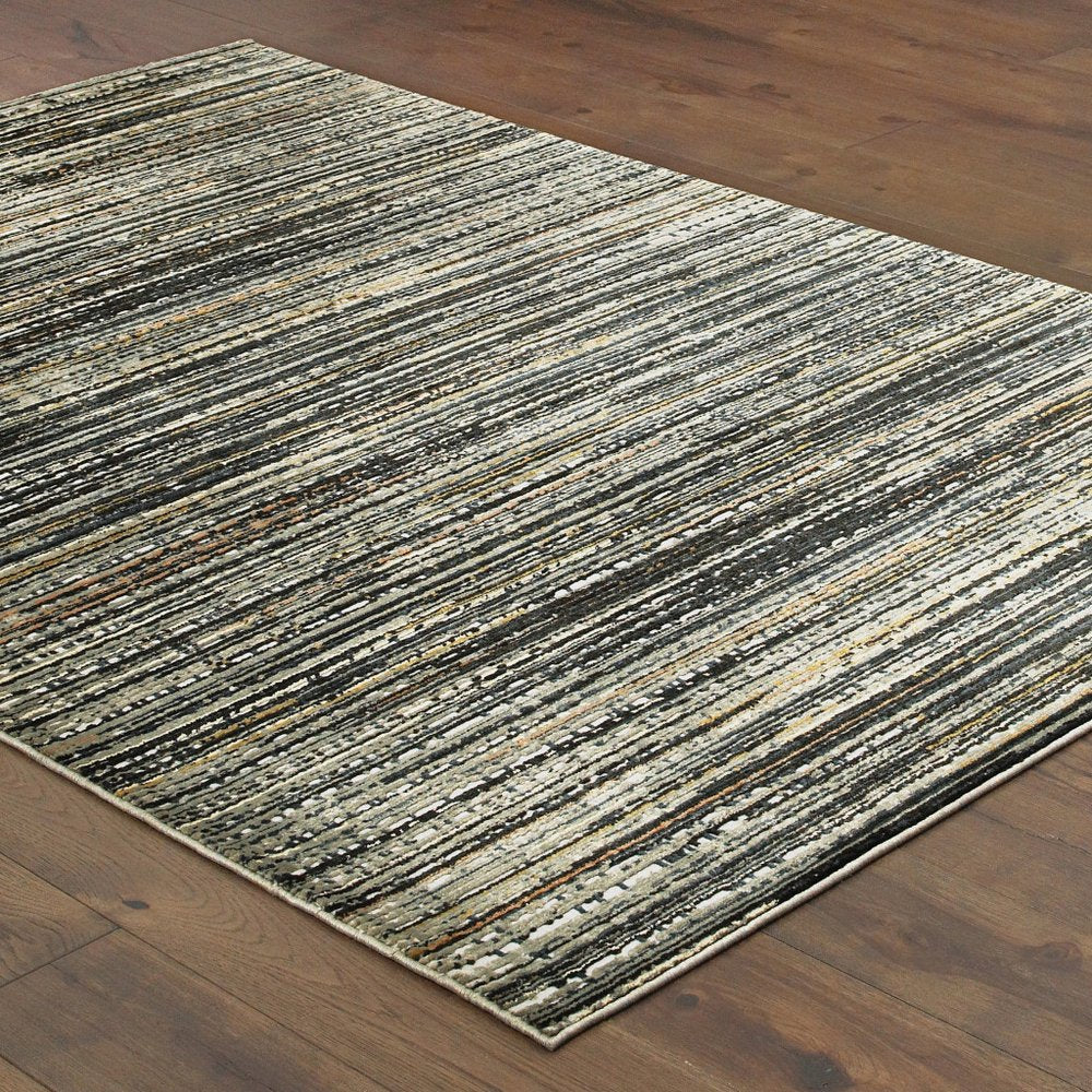 2' X 8' Black Navy Gold Ivory And Blush Abstract Power Loom Stain Resistant Runner Rug
