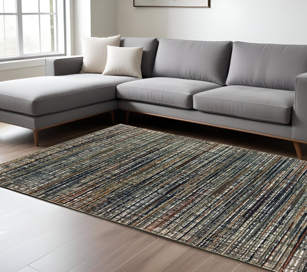 2' X 8' Black Navy Gold Ivory And Blush Abstract Power Loom Stain Resistant Runner Rug