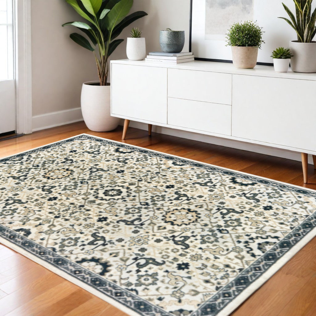 2' X 8' Ivory Navy And Gold Oriental Power Loom Stain Resistant Runner Rug