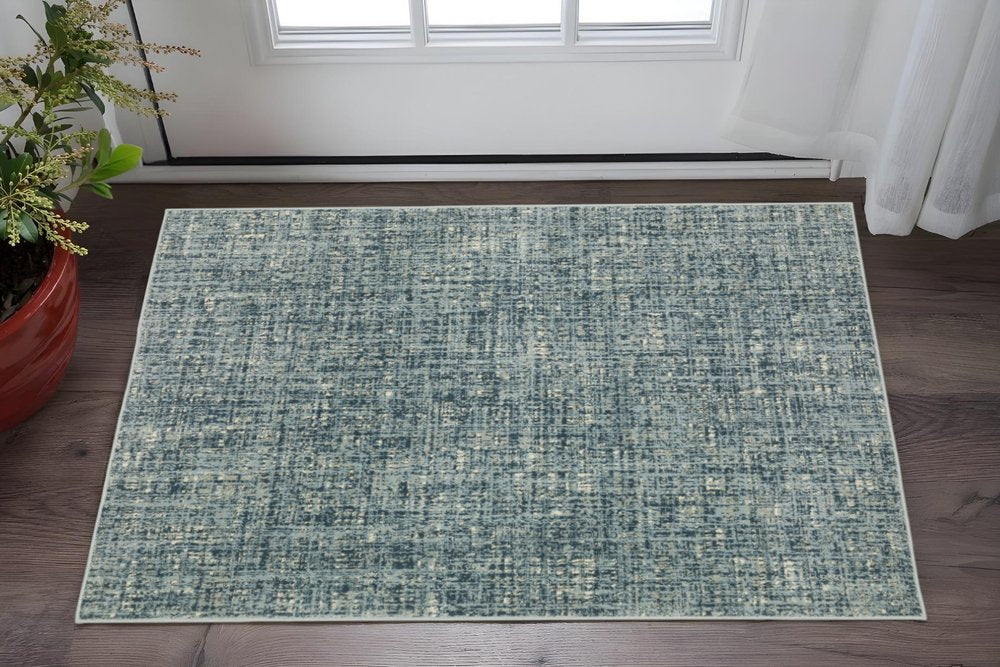 8' X 10' Dark Blue Light Blue Grey Ivory And Beige Abstract Power Loom Stain Resistant Area Rug