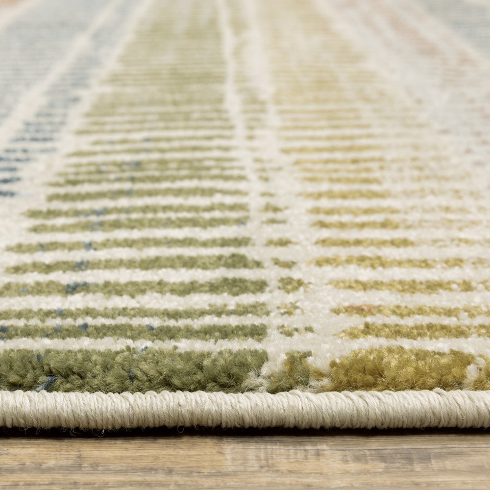 10' X 13' Ivory Blue Green Red And Gold Geometric Power Loom Stain Resistant Area Rug