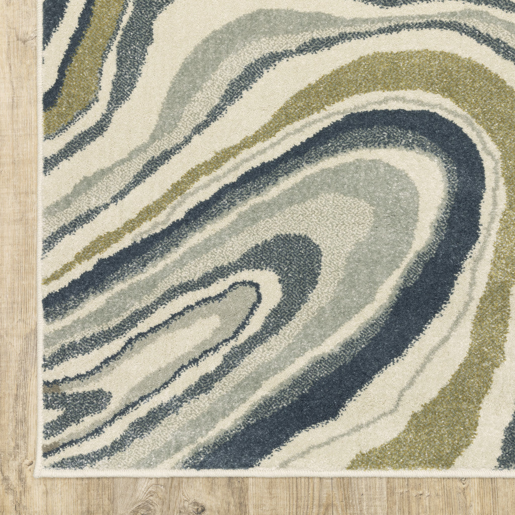 7' X 9' Ivory And Blue Abstract Area Rug