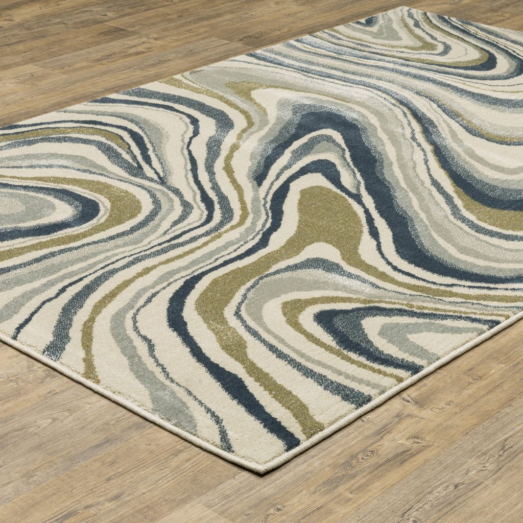 7' X 9' Ivory And Blue Abstract Area Rug