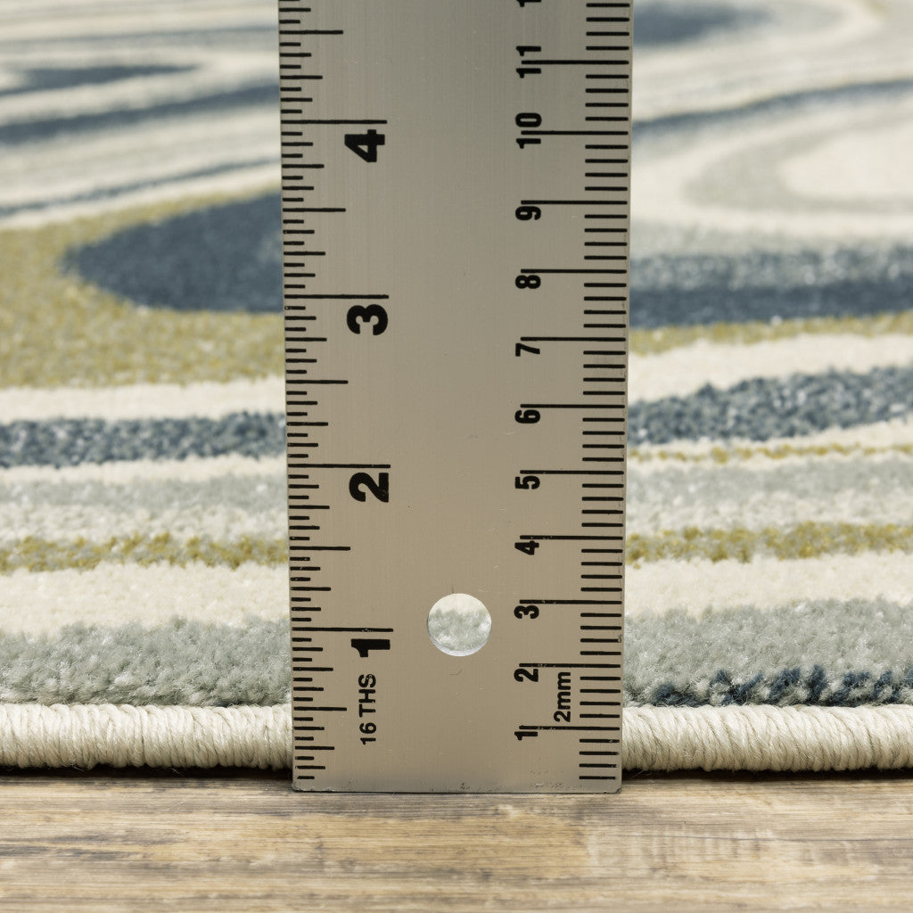 7' X 9' Ivory And Blue Abstract Area Rug