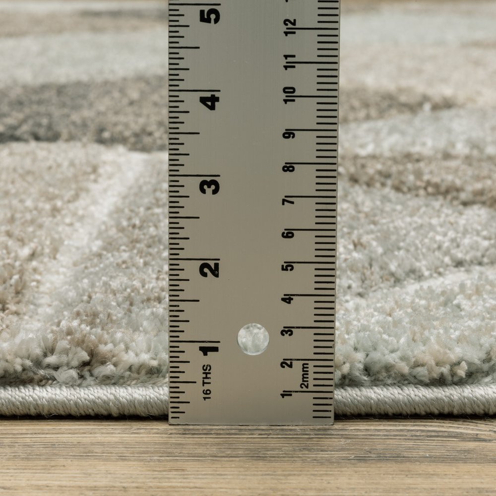 8' X 11' Gray And Ivory Geometric Area Rug