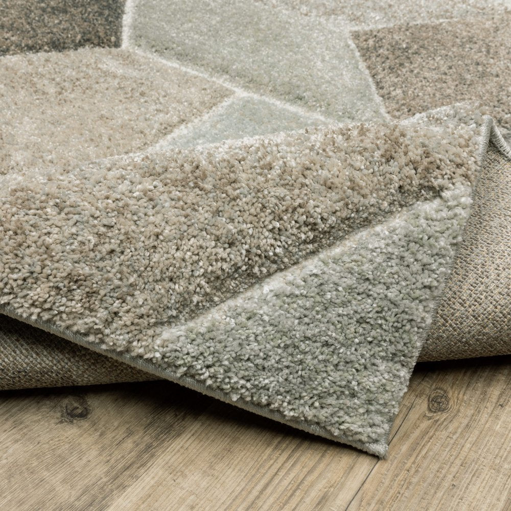 8' X 11' Gray And Ivory Geometric Area Rug