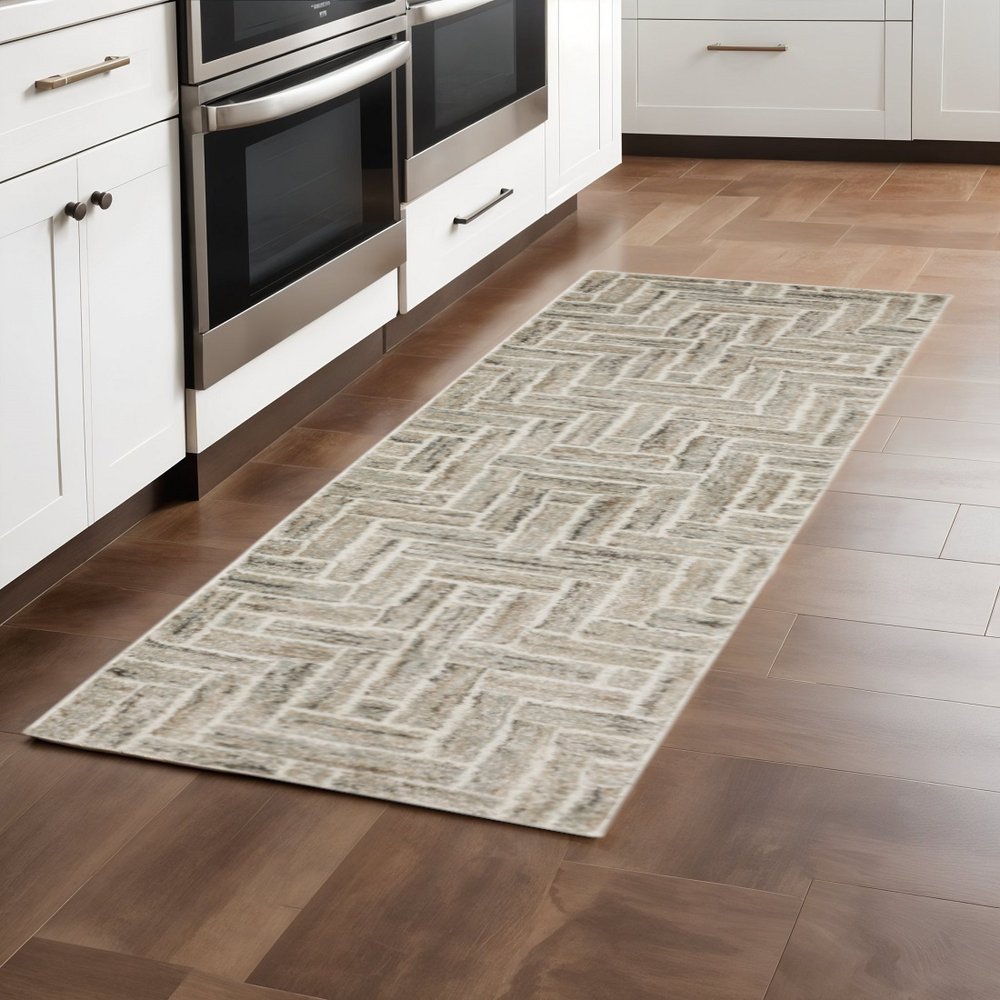5' X 8' Ivory Beige Grey Brown Pale Blue And Charcoal Geometric Power Loom Stain Resistant Area Rug