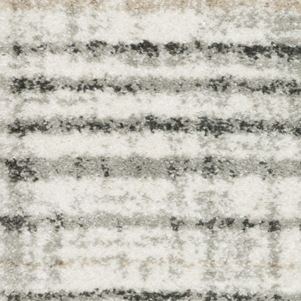 6' X 9' Grey Charcoal Ivory Tan Brown And Beige Geometric Power Loom Stain Resistant Area Rug