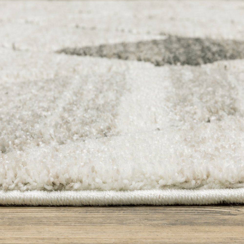 8' X 11' Beige And Gray Geometric Area Rug