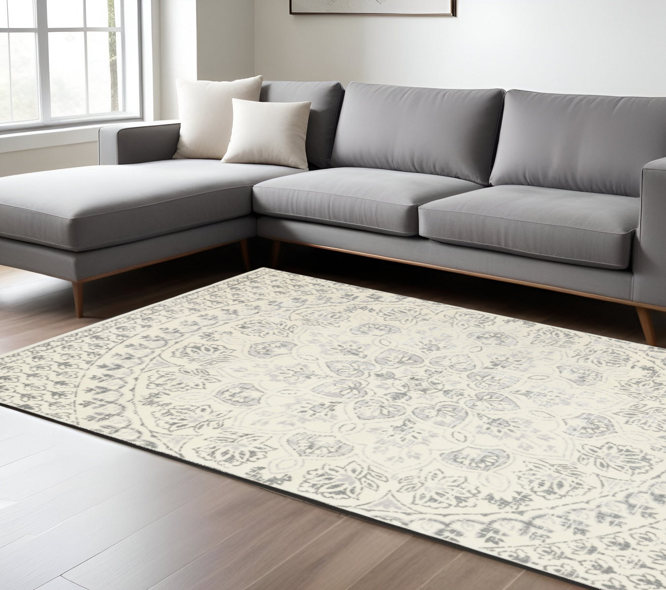 10' X 13' Ivory And Grey Floral Power Loom Stain Resistant Area Rug