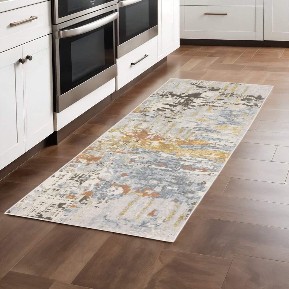 5' X 8' Grey Blue Beige Gold And Rust Abstract Power Loom Stain Resistant Area Rug