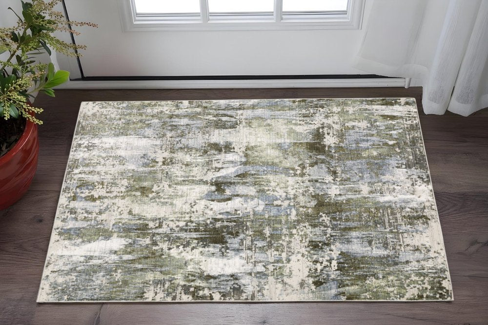 2' X 8' Green Blue Grey Ivory And Brown Abstract Power Loom Stain Resistant Runner Rug