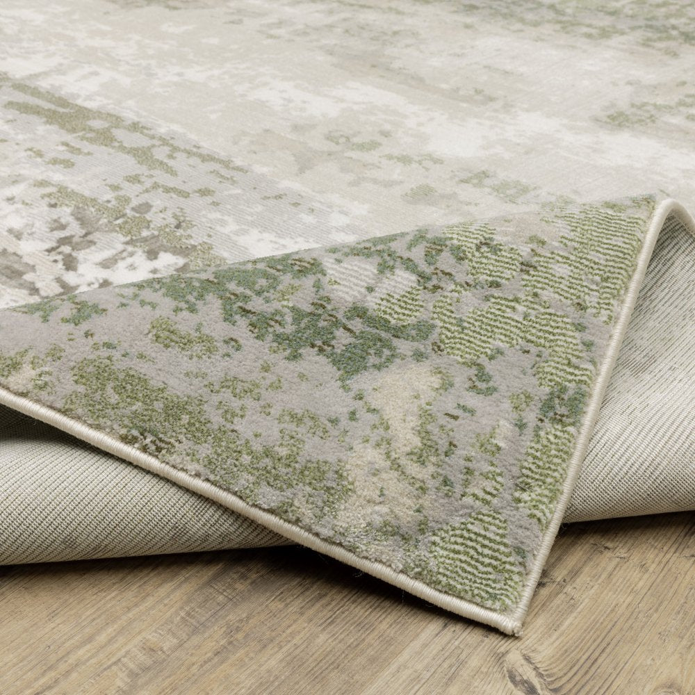 3' X 5' Beige Grey Brown And Sage Green Abstract Power Loom Stain Resistant Area Rug