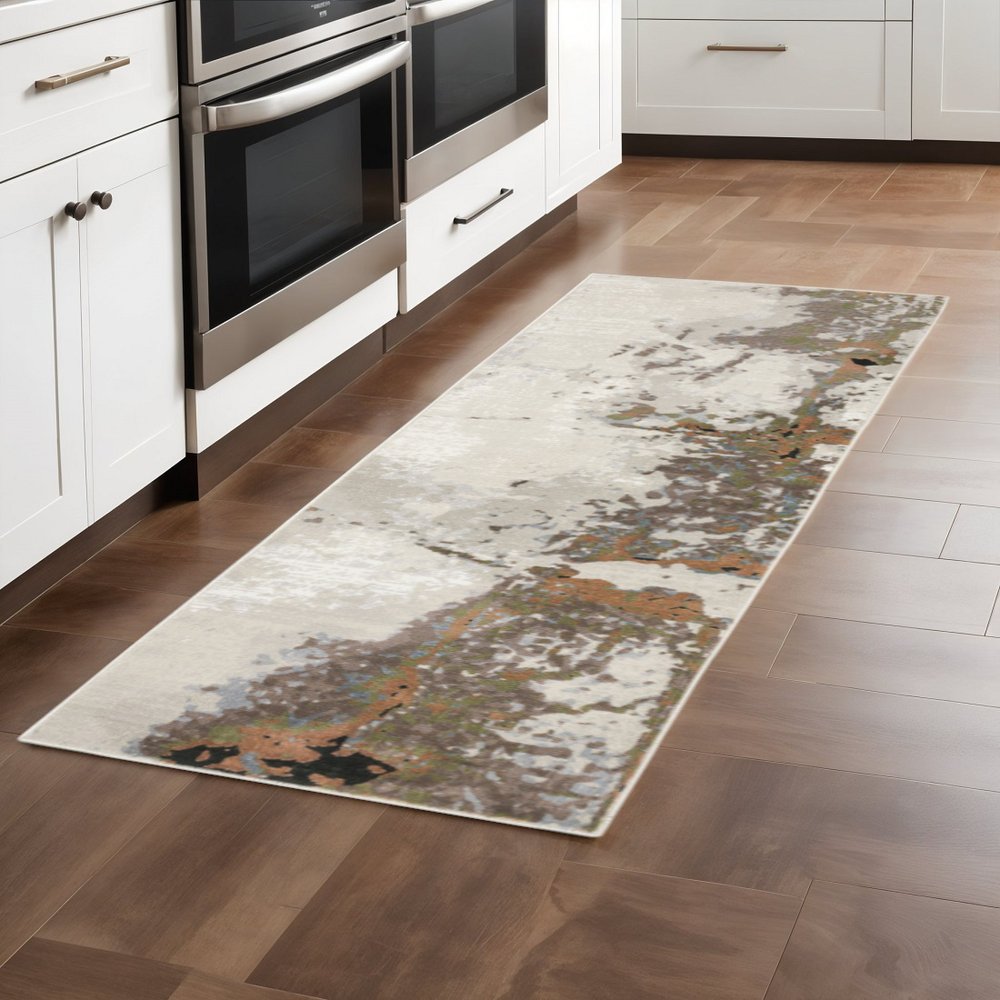 8' X 11' Beige And Pink Abstract Distressed Area Rug