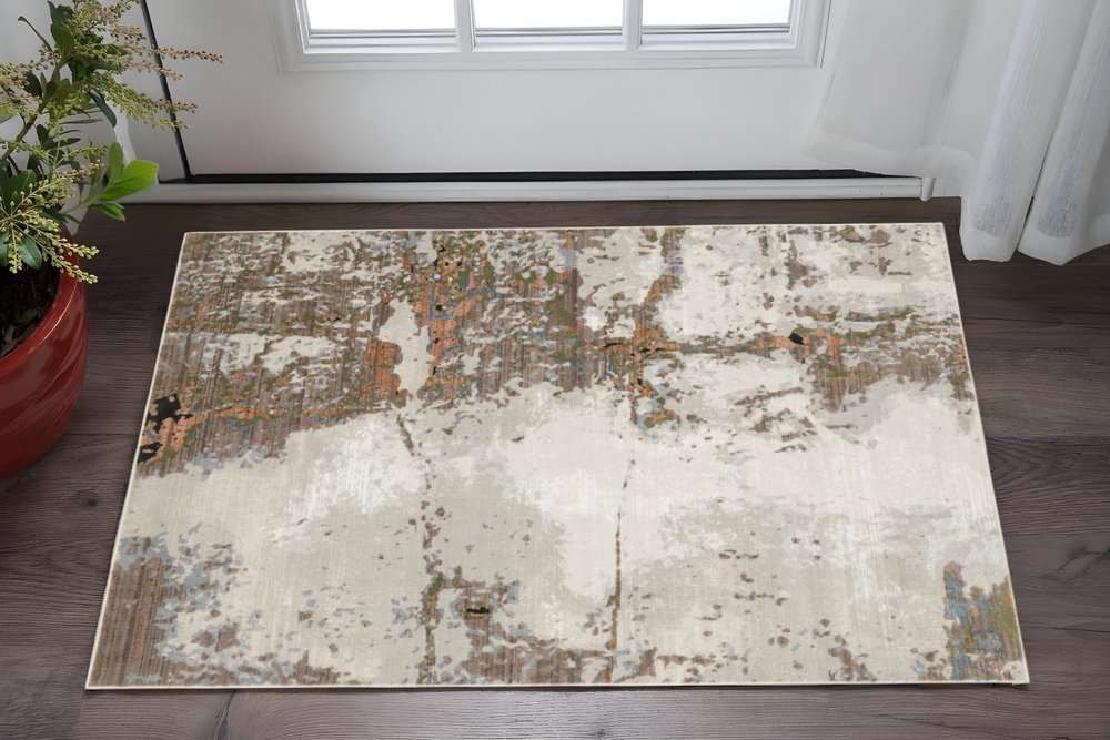 8' X 11' Beige And Pink Abstract Distressed Area Rug