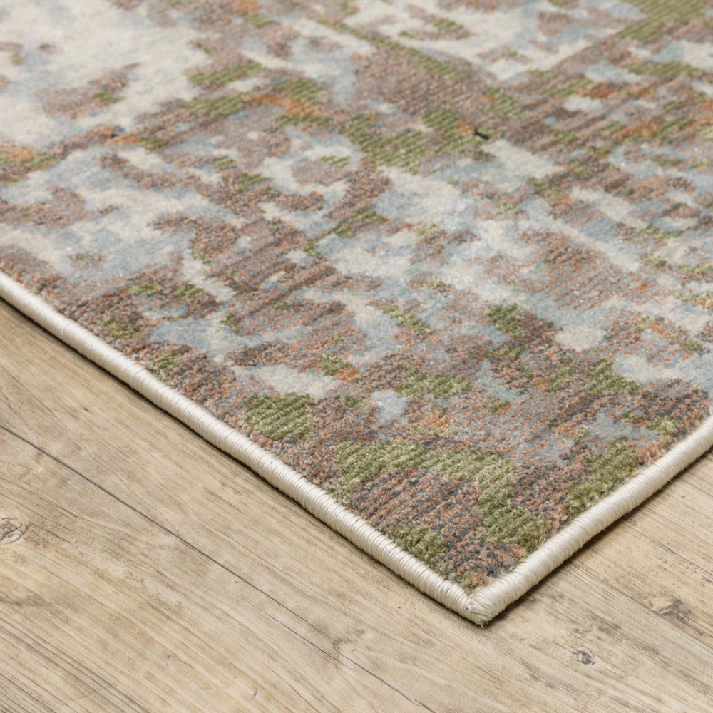 8' X 11' Beige And Pink Abstract Distressed Area Rug