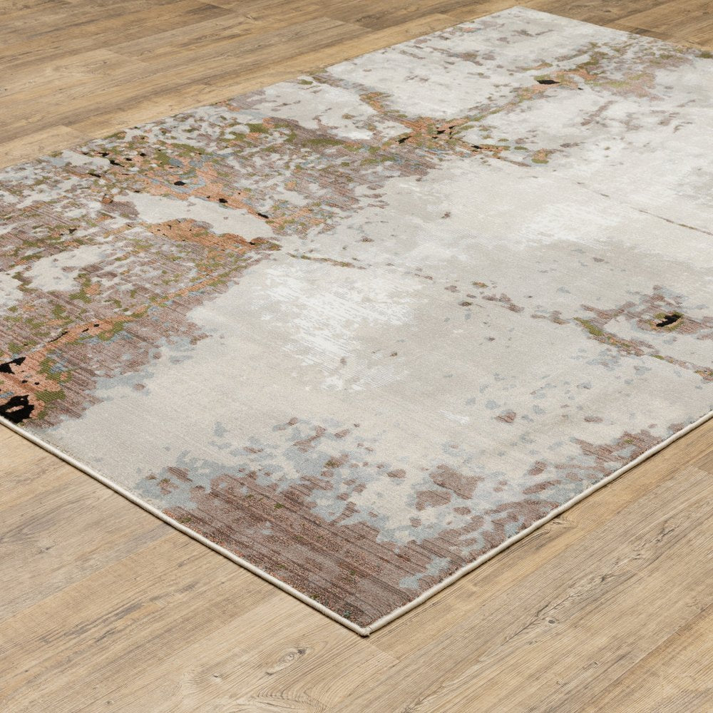 8' X 11' Beige And Pink Abstract Distressed Area Rug