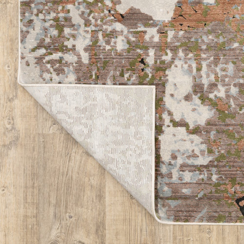 8' X 11' Beige And Pink Abstract Distressed Area Rug