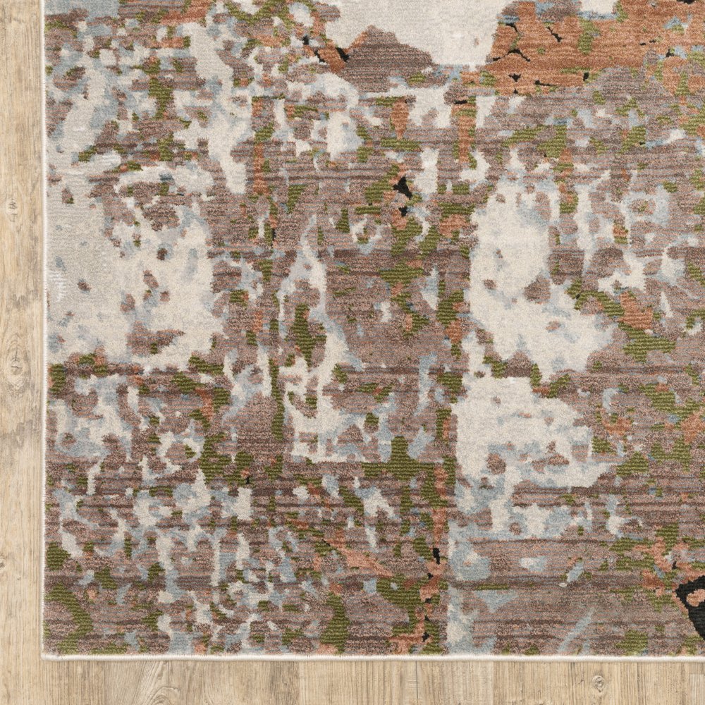 8' X 11' Beige And Pink Abstract Distressed Area Rug