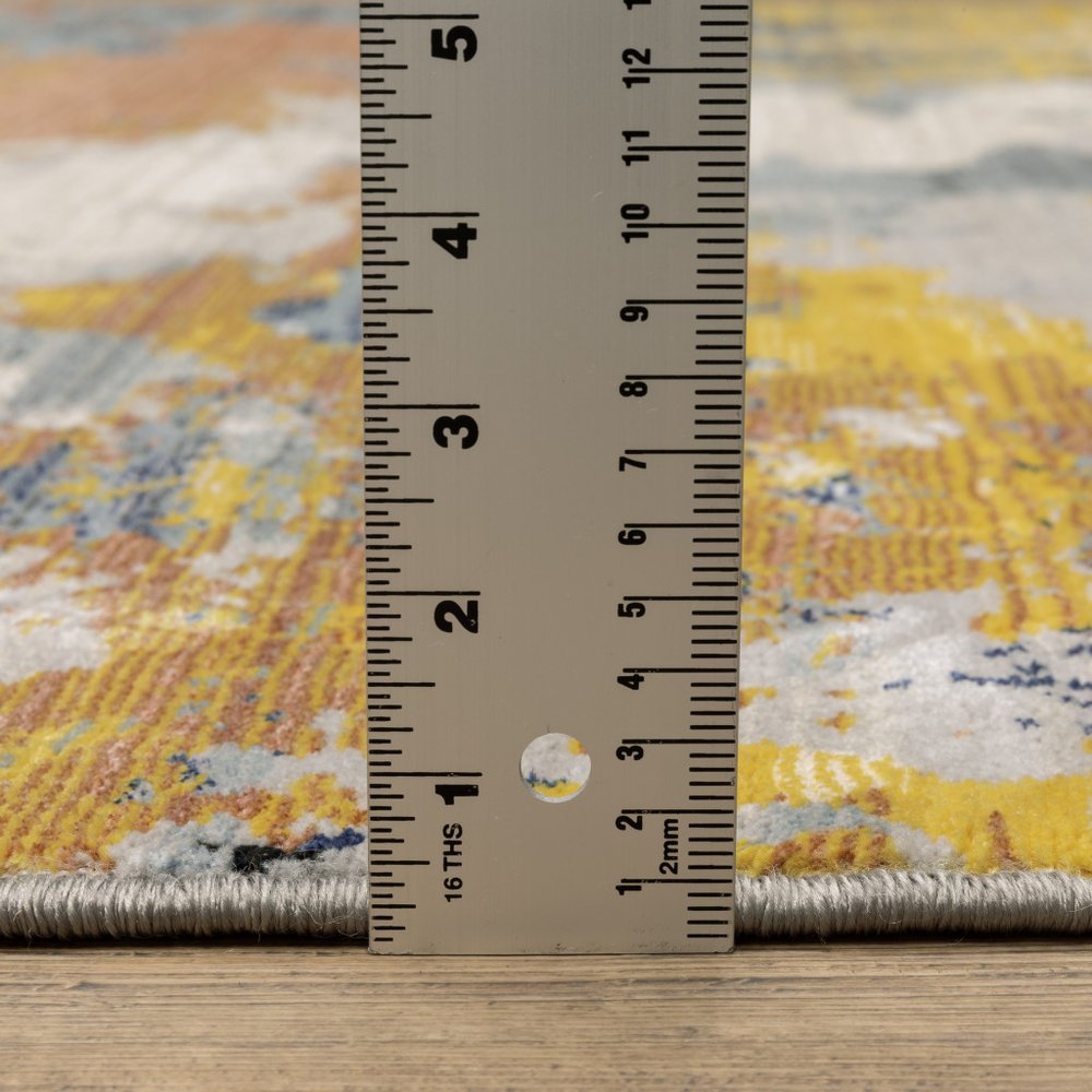 5' X 8' Yellow Gold Blue Grey Brown And Beige Abstract Power Loom Stain Resistant Area Rug