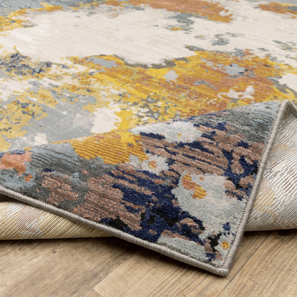 5' X 8' Yellow Gold Blue Grey Brown And Beige Abstract Power Loom Stain Resistant Area Rug