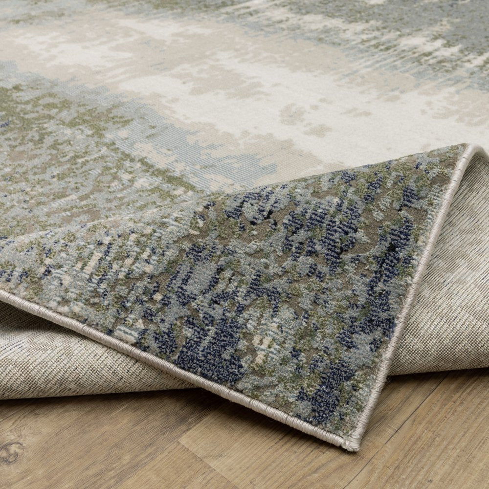 10' X 13' Blue Green Grey And Beige Abstract Power Loom Stain Resistant Area Rug