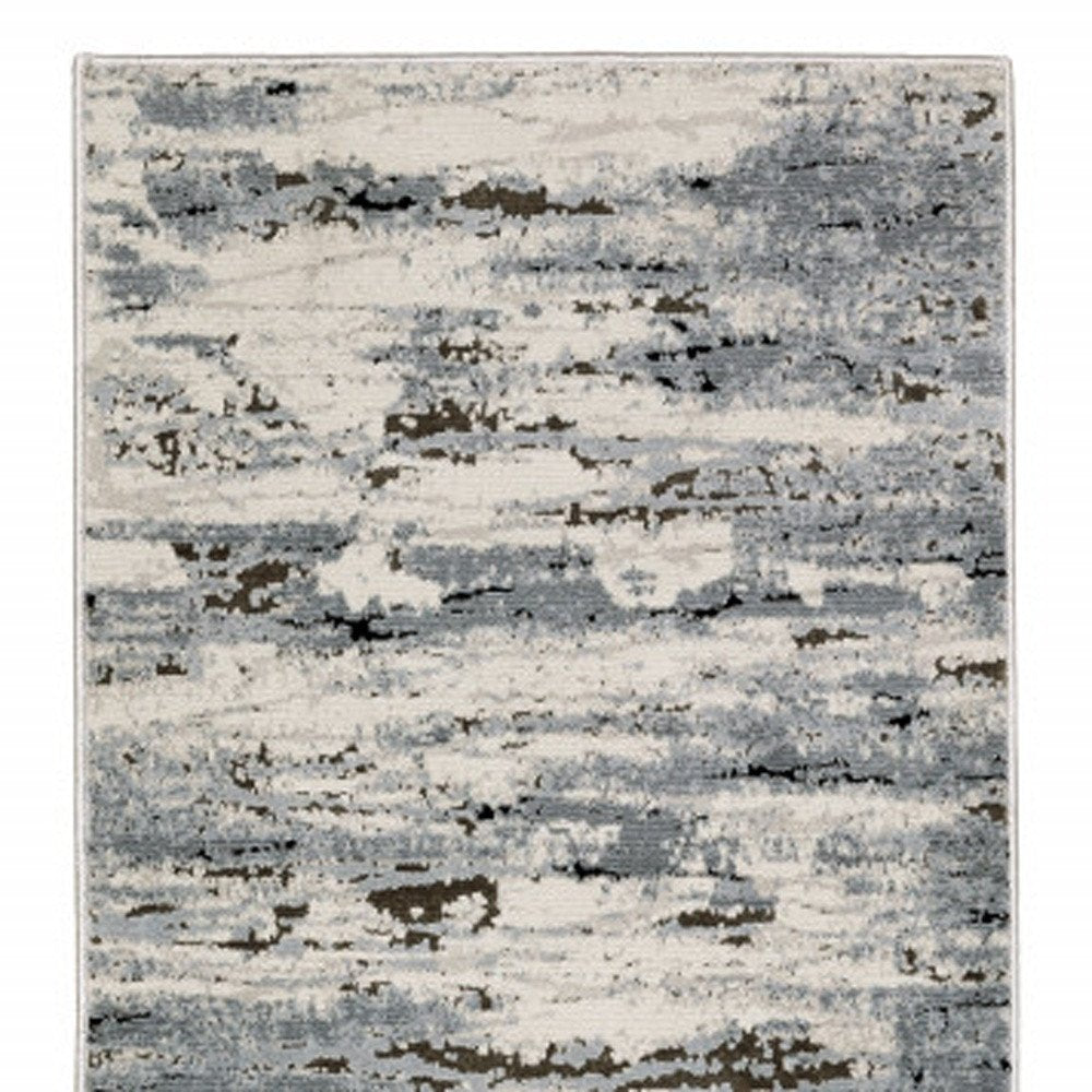 3' X 5' Blue Grey Beige And Brown Abstract Power Loom Stain Resistant Area Rug