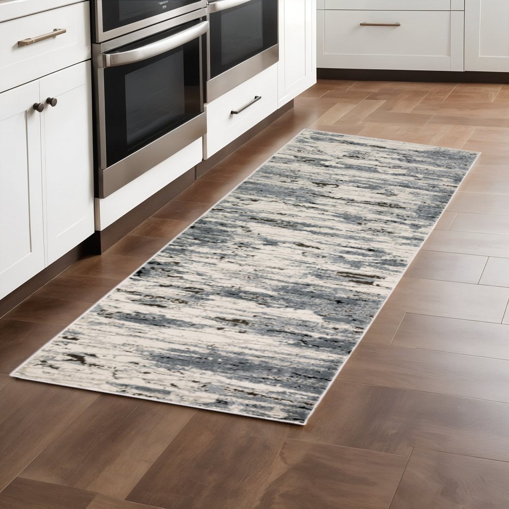 3' X 5' Blue Grey Beige And Brown Abstract Power Loom Stain Resistant Area Rug