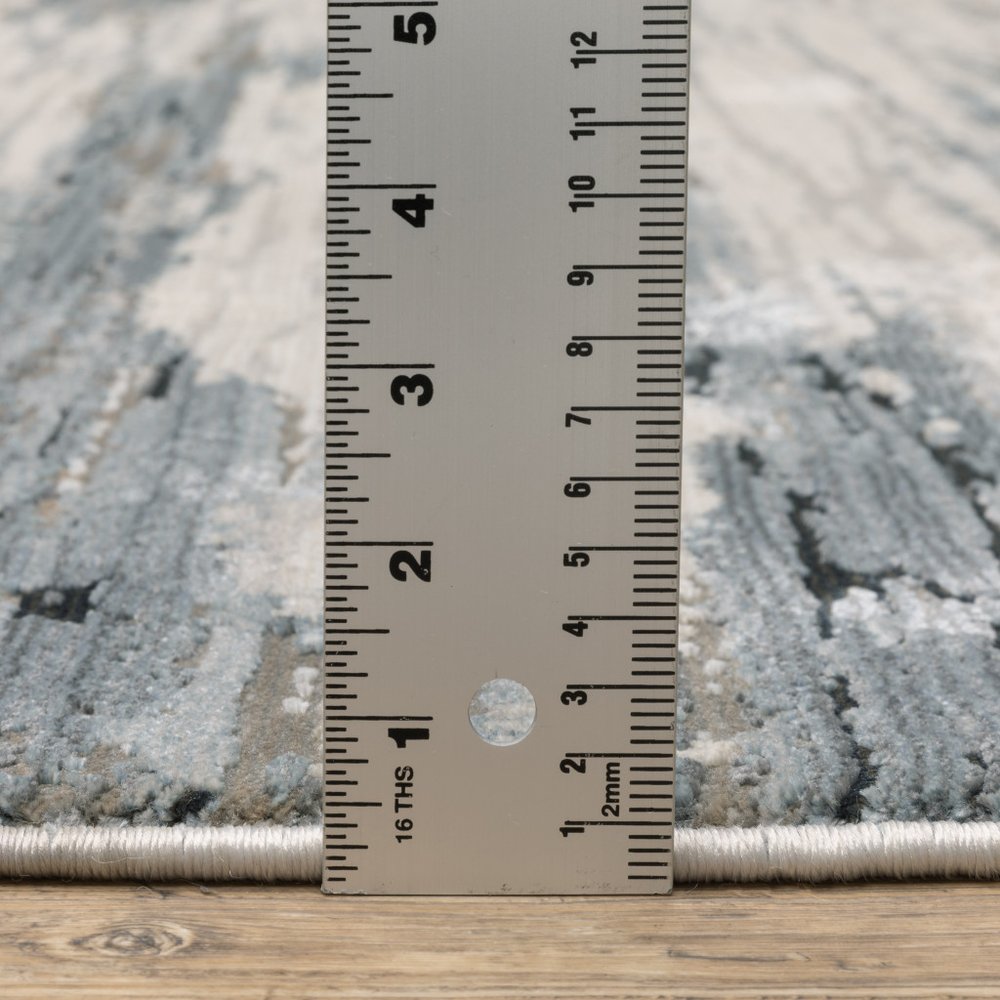 3' X 5' Blue Grey Beige And Brown Abstract Power Loom Stain Resistant Area Rug