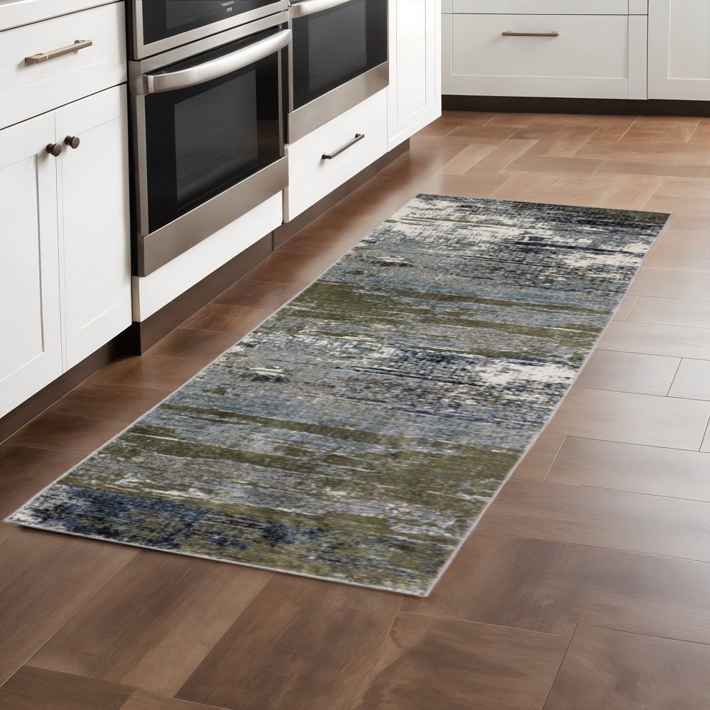 5' X 8' Gold Brown Rust Grey Blue And Beige Abstract Power Loom Stain Resistant Area Rug