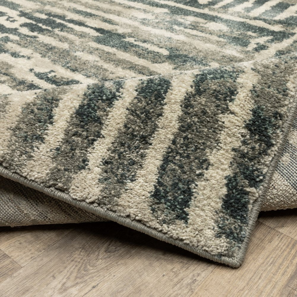 8' X 10' Blue And Beige Abstract Power Loom Stain Resistant Area Rug