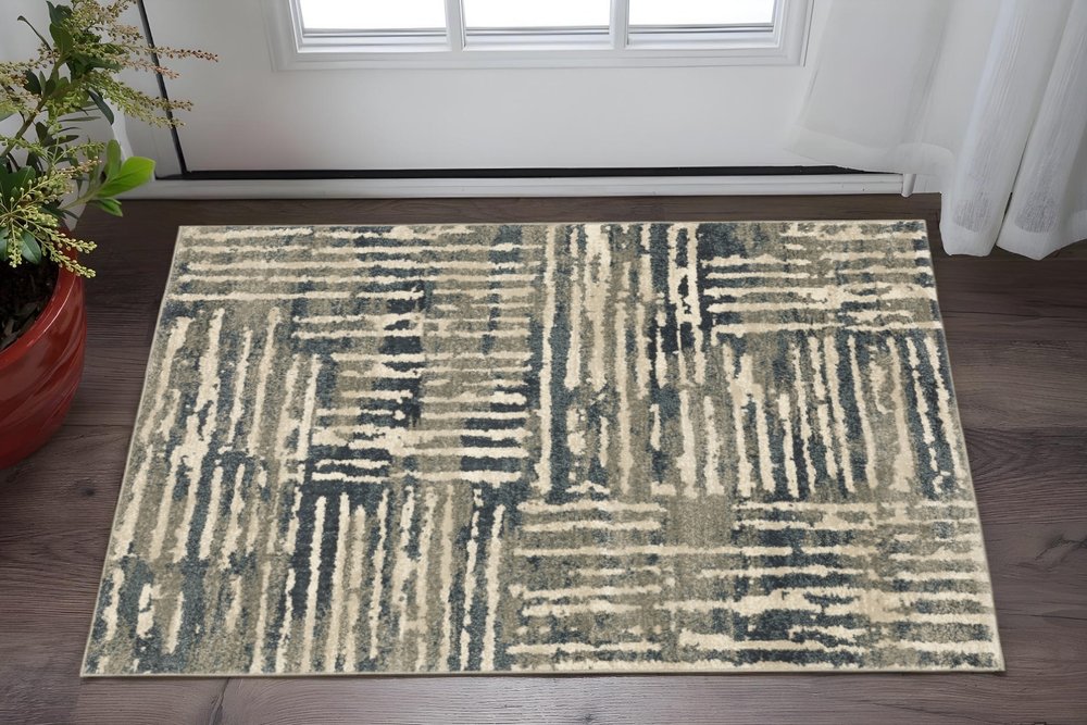 8' X 10' Blue And Beige Abstract Power Loom Stain Resistant Area Rug
