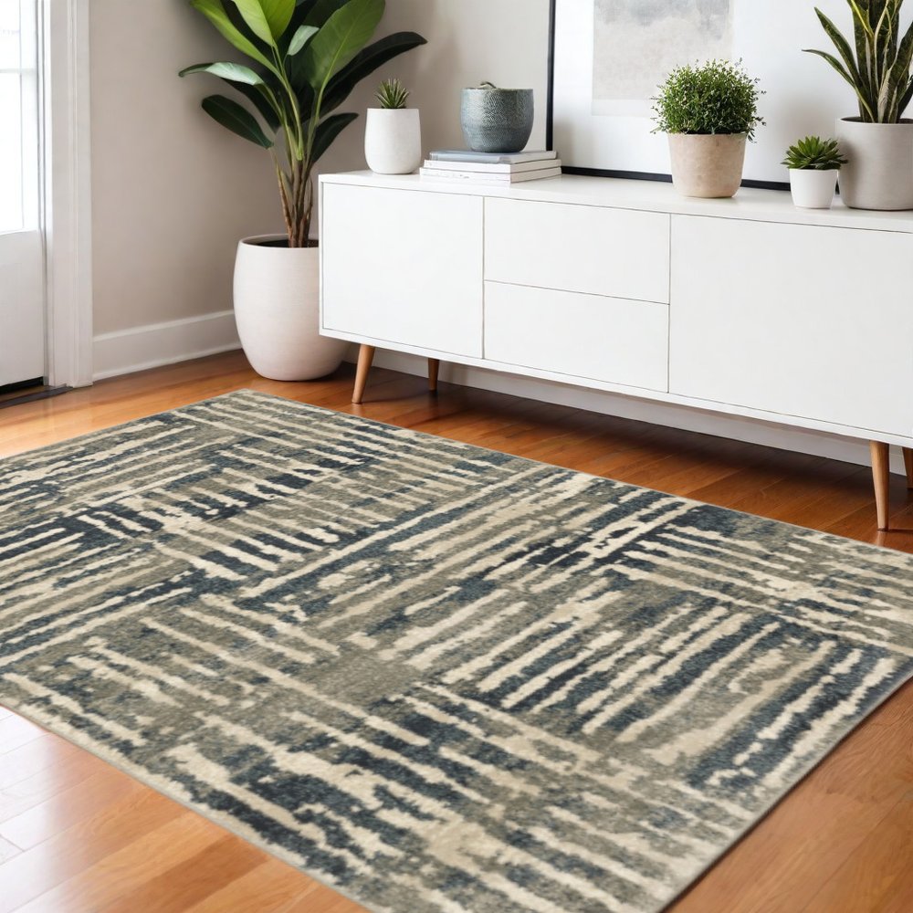8' X 10' Blue And Beige Abstract Power Loom Stain Resistant Area Rug