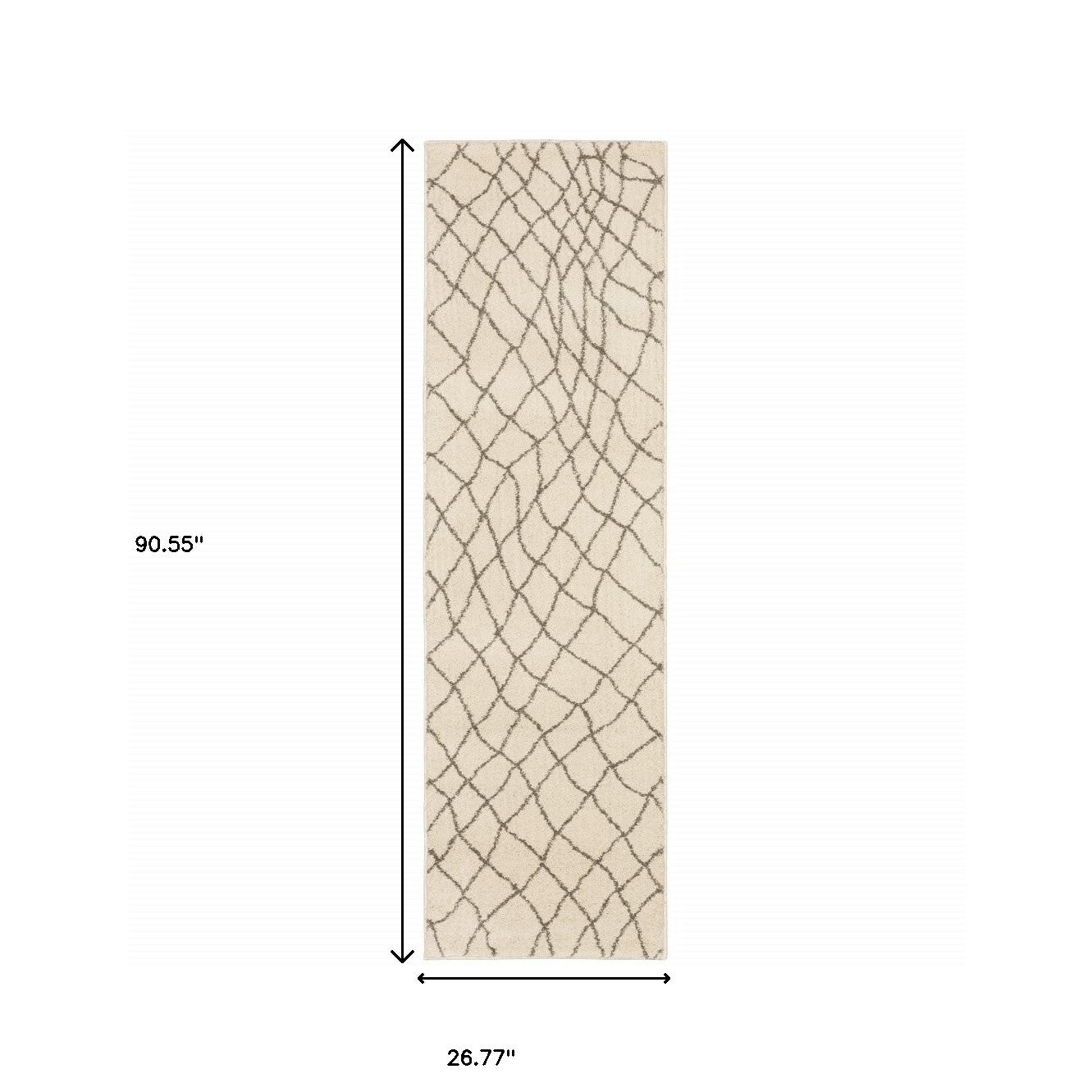 5' X 7' Ivory And Grey Geometric Power Loom Stain Resistant Area Rug