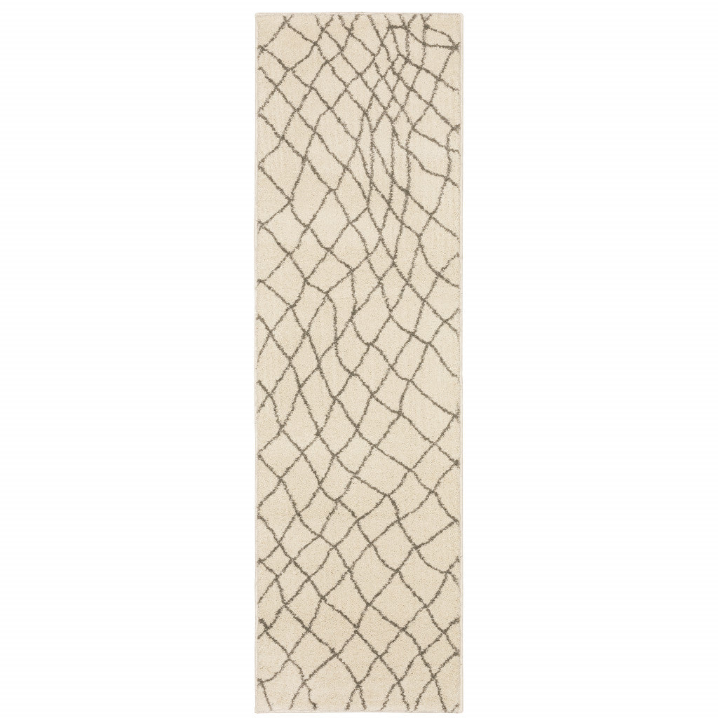 5' X 7' Ivory And Grey Geometric Power Loom Stain Resistant Area Rug