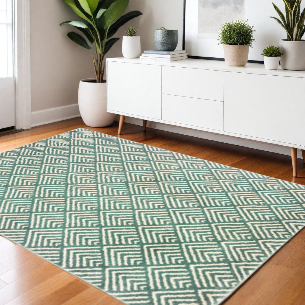 2' X 8' Foam Blue And Ivory Geometric Power Loom Stain Resistant Runner Rug