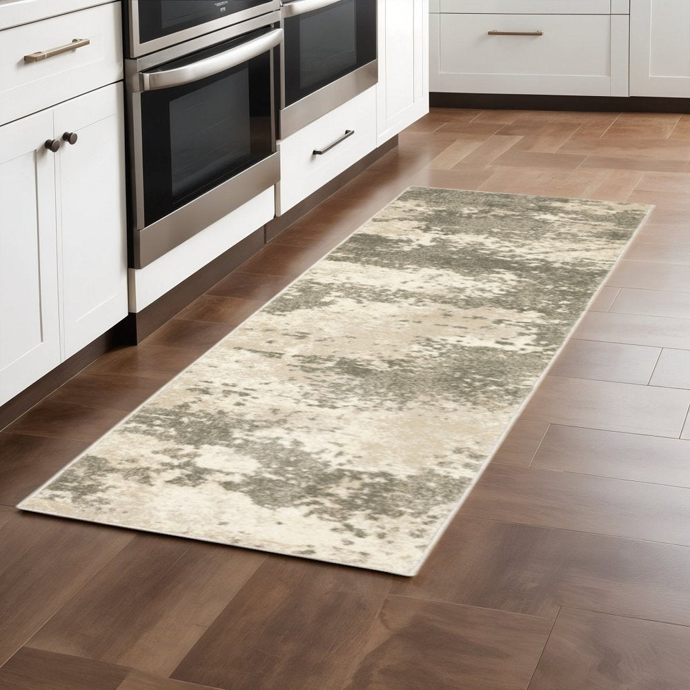 5' X 7' Beige And Grey Abstract Power Loom Stain Resistant Area Rug