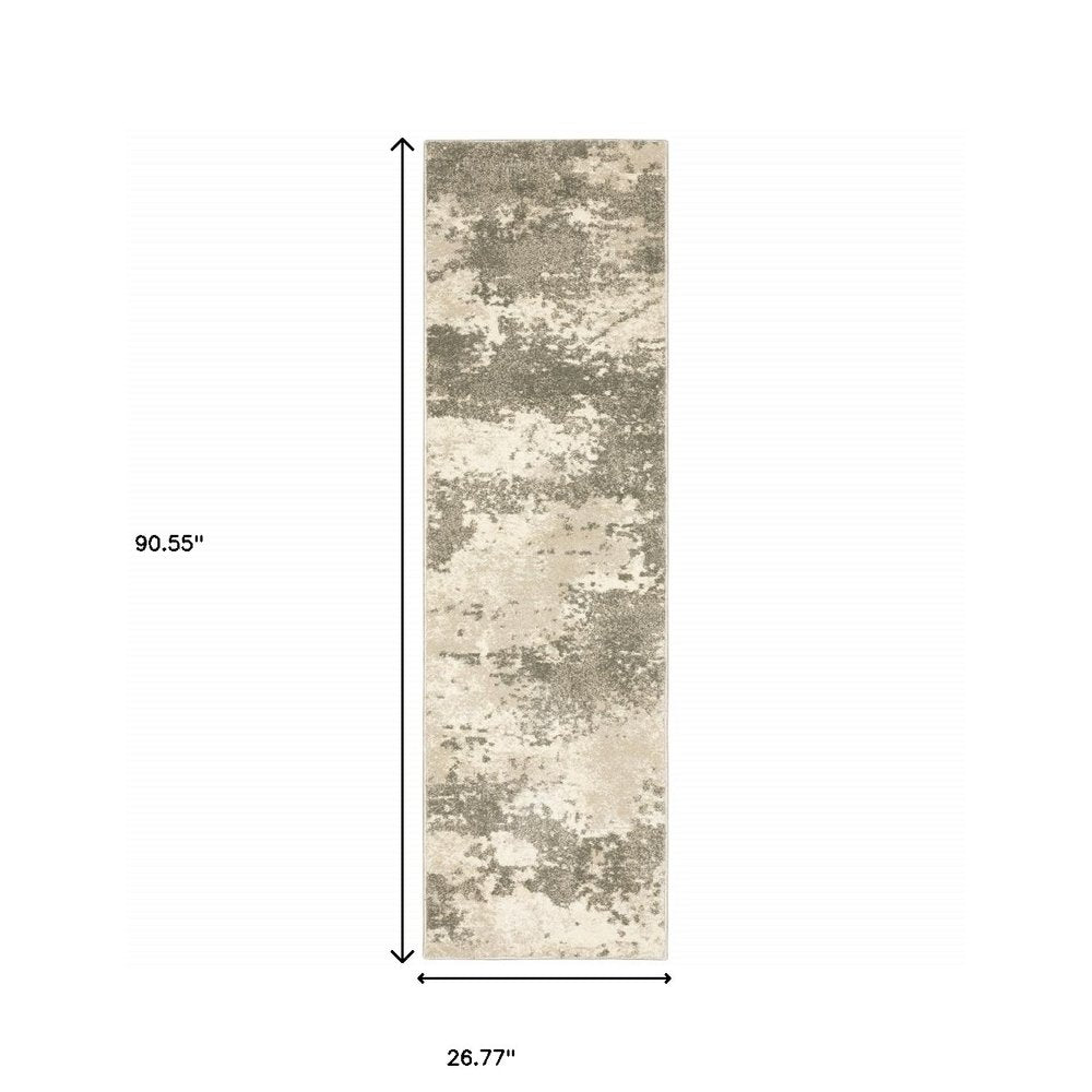 5' X 7' Beige And Grey Abstract Power Loom Stain Resistant Area Rug