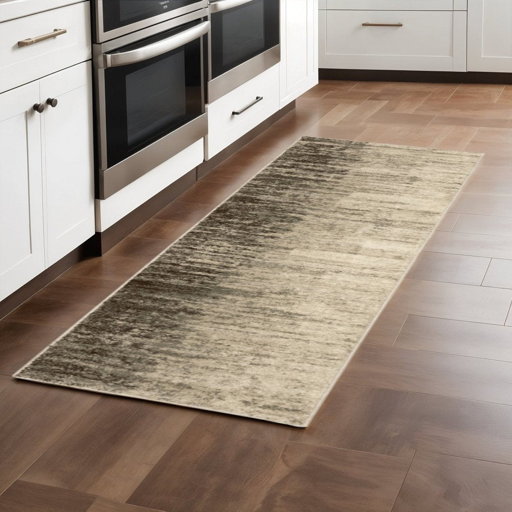 5' X 7' Beige And Grey Abstract Power Loom Stain Resistant Area Rug