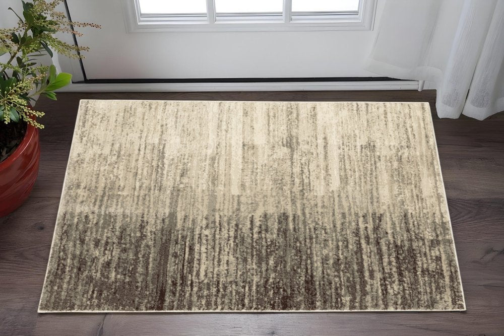 5' X 7' Beige And Grey Abstract Power Loom Stain Resistant Area Rug
