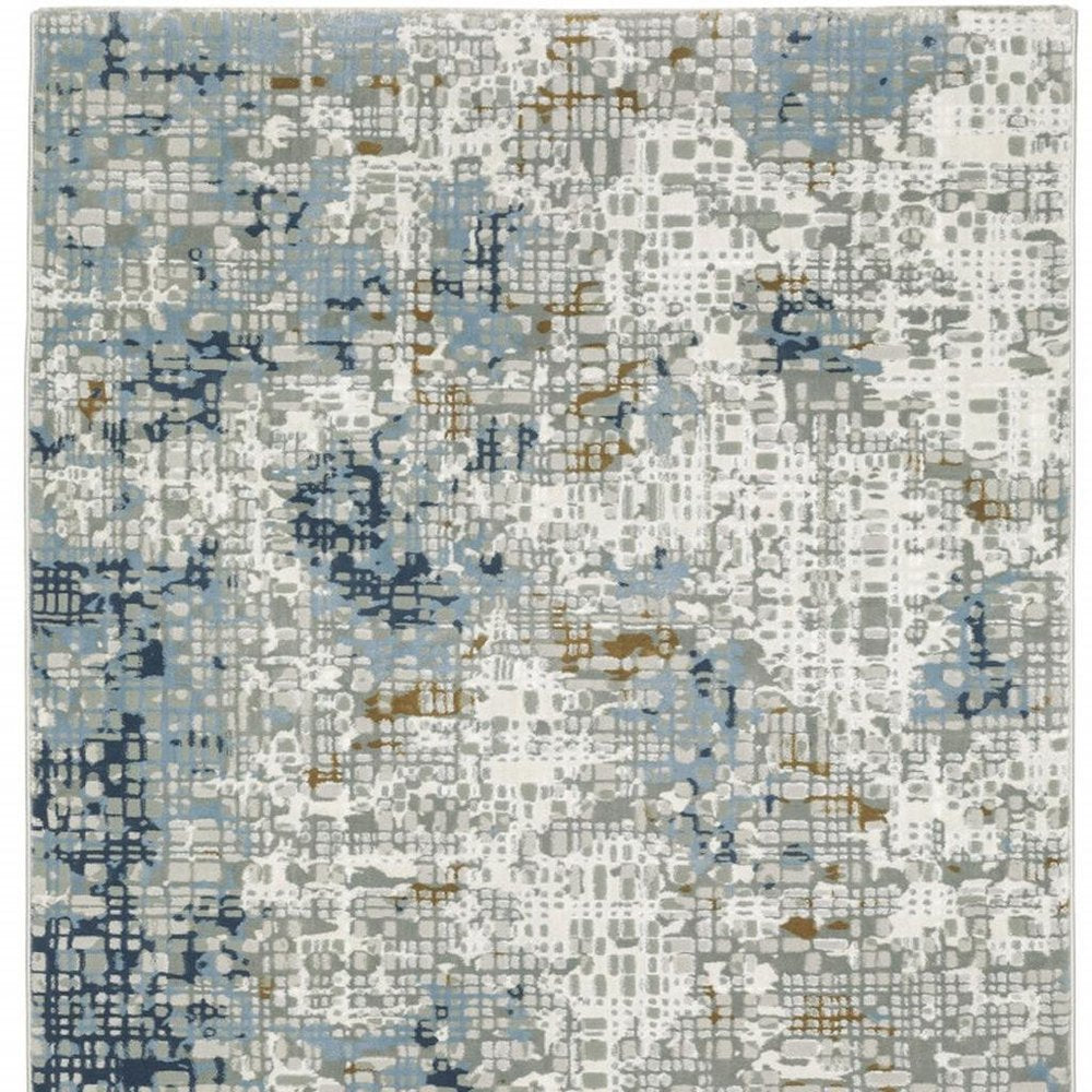 5' X 8' Blue Ivory Grey Brown Beige And Light Blue Abstract Power Loom Stain Resistant Area Rug