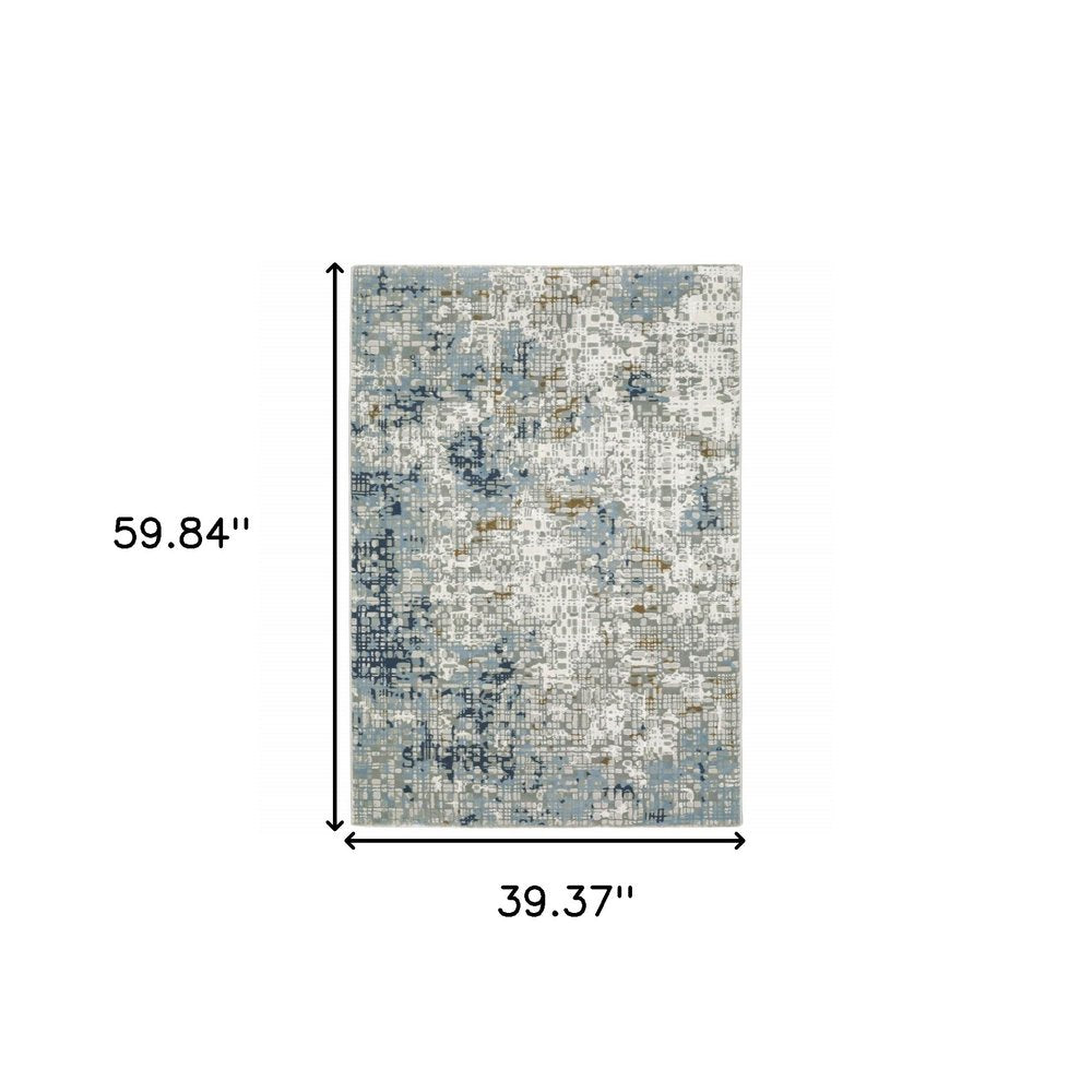 5' X 8' Blue Ivory Grey Brown Beige And Light Blue Abstract Power Loom Stain Resistant Area Rug
