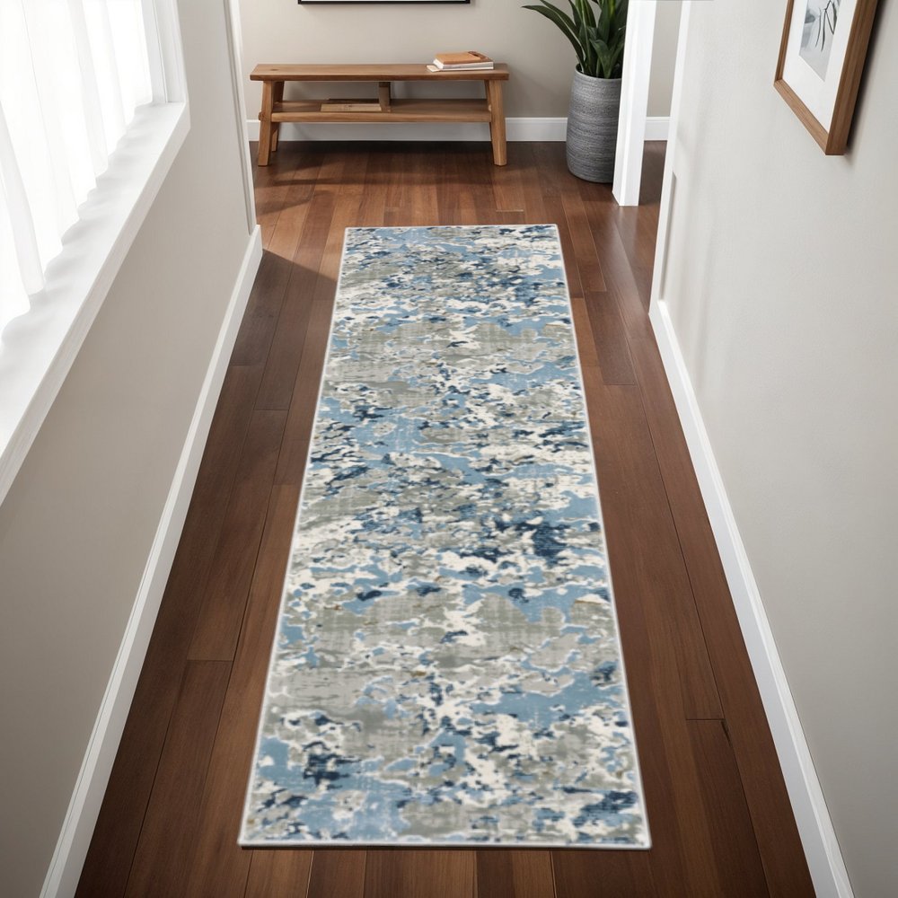 5' X 8' Grey Blue Ivory Navy Beige And Brown Abstract Power Loom Stain Resistant Area Rug