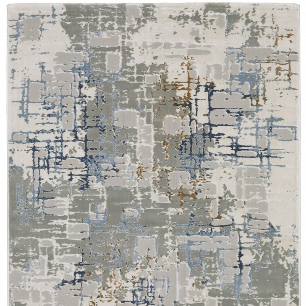 10' X 13' Grey Blue Brown Ivory And Deep Blue Abstract Power Loom Stain Resistant Area Rug