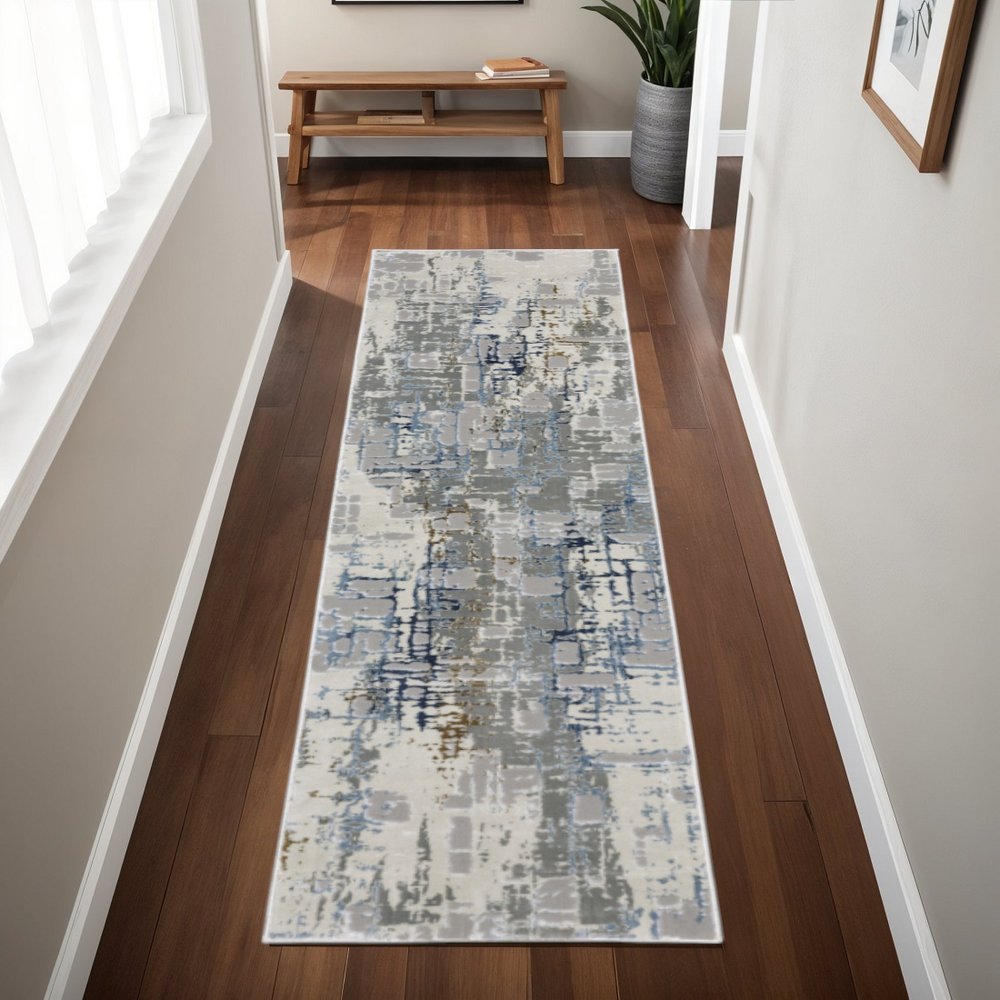 10' X 13' Grey Blue Brown Ivory And Deep Blue Abstract Power Loom Stain Resistant Area Rug