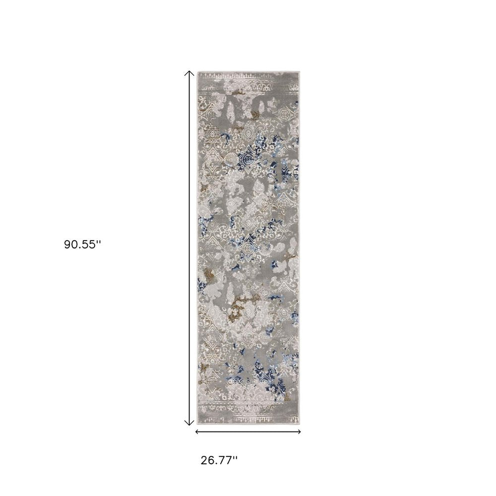 5' X 8' Grey Blue Ivory Brown And Navy Abstract Power Loom Stain Resistant Area Rug