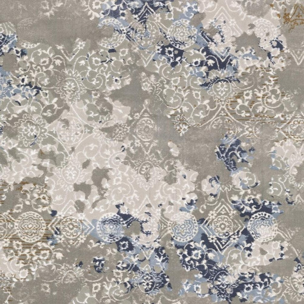 5' X 8' Grey Blue Ivory Brown And Navy Abstract Power Loom Stain Resistant Area Rug