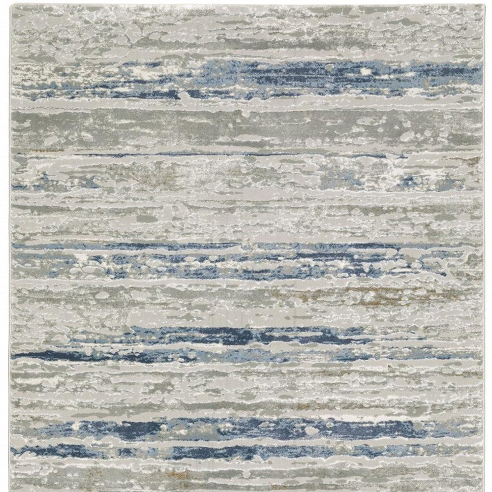 2' X 8' Grey Blue Light Blue Ivory And Brown Abstract Power Loom Stain Resistant Runner Rug