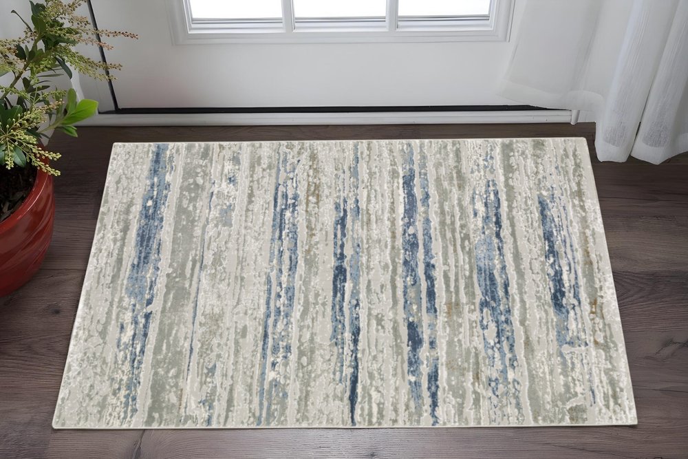2' X 8' Grey Blue Light Blue Ivory And Brown Abstract Power Loom Stain Resistant Runner Rug