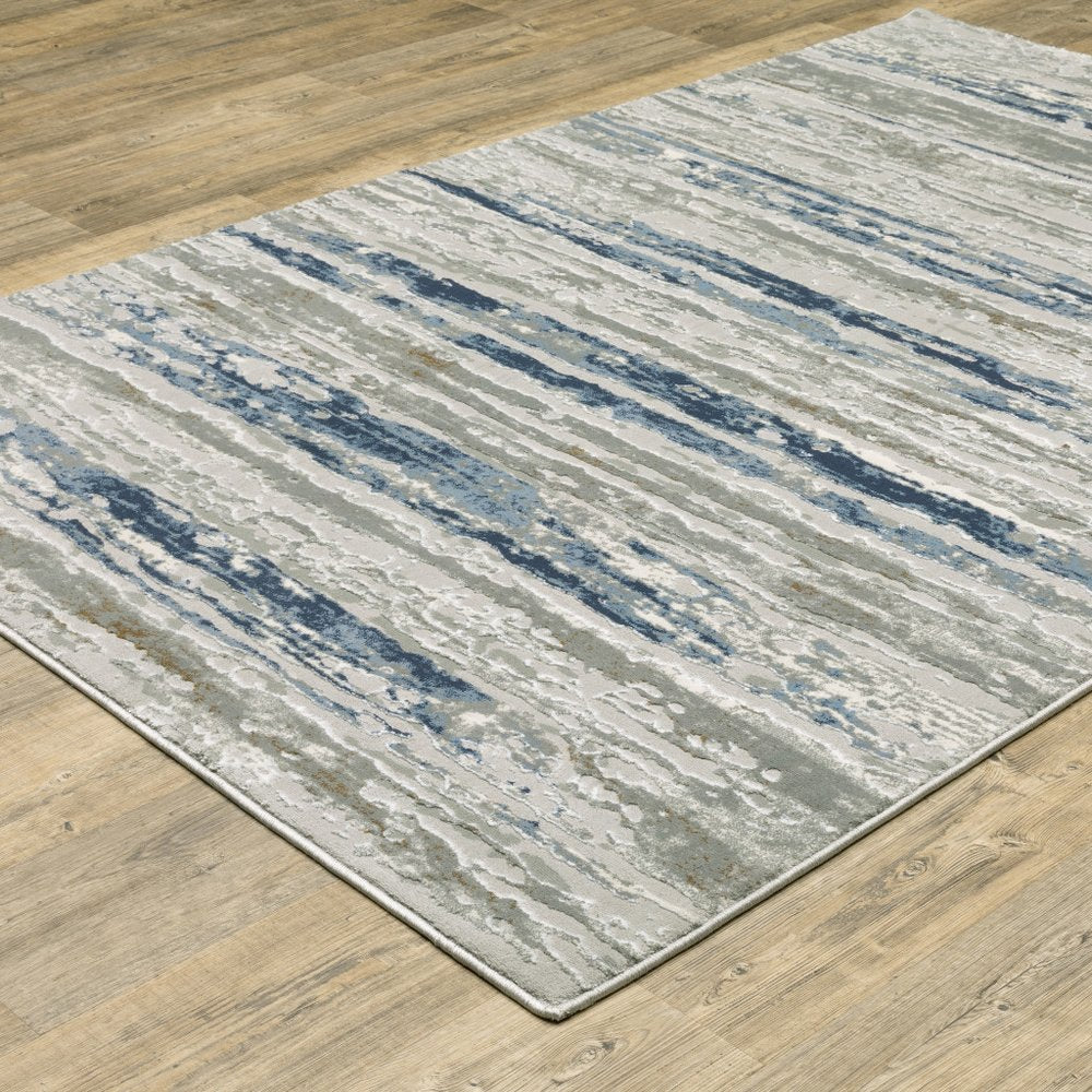 2' X 8' Grey Blue Light Blue Ivory And Brown Abstract Power Loom Stain Resistant Runner Rug